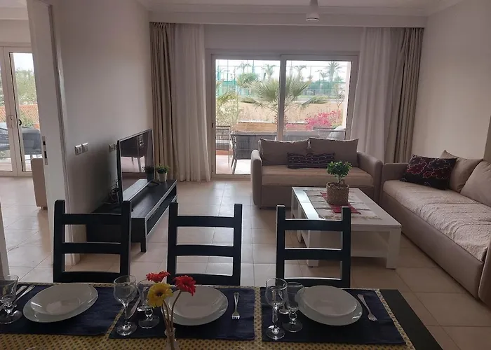 Apartment Golf, & Sea - Serene Garden Patio Getaway *
