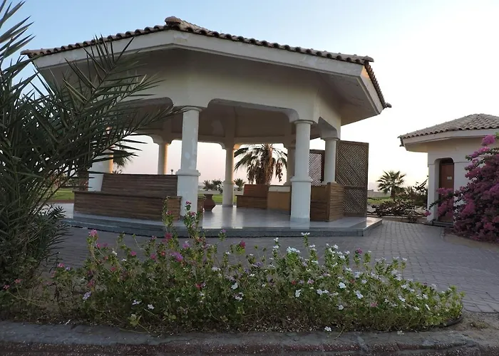 Apartment Golf, & Sea - Serene Garden Patio Getaway *